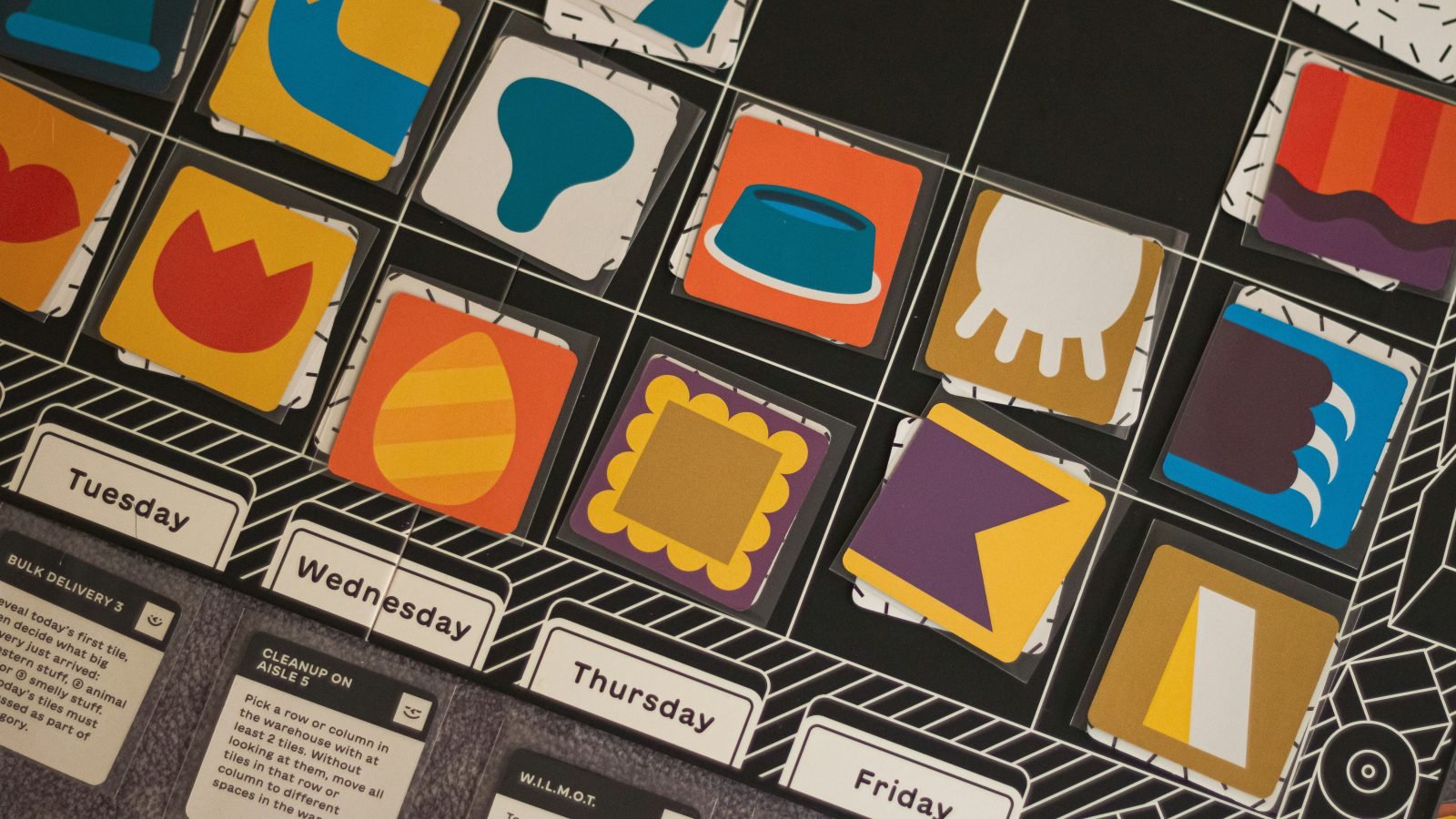 Colorful icons on a grid weekly view, illustrative for a Monday review.