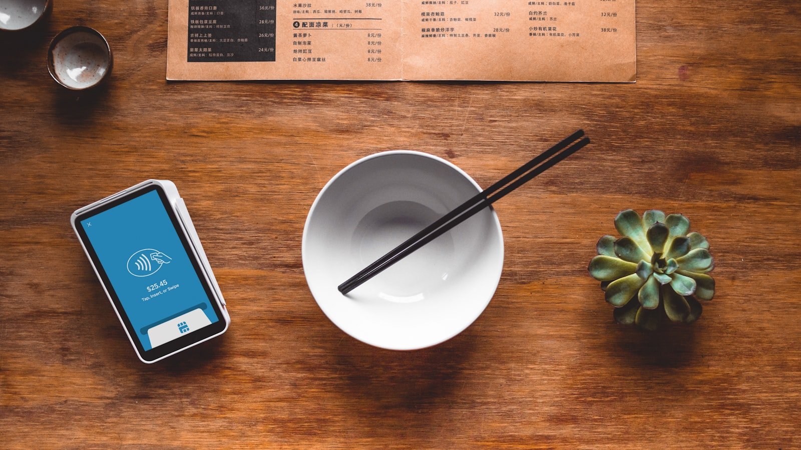 Corporate credit cards on desk evoking modern spend management