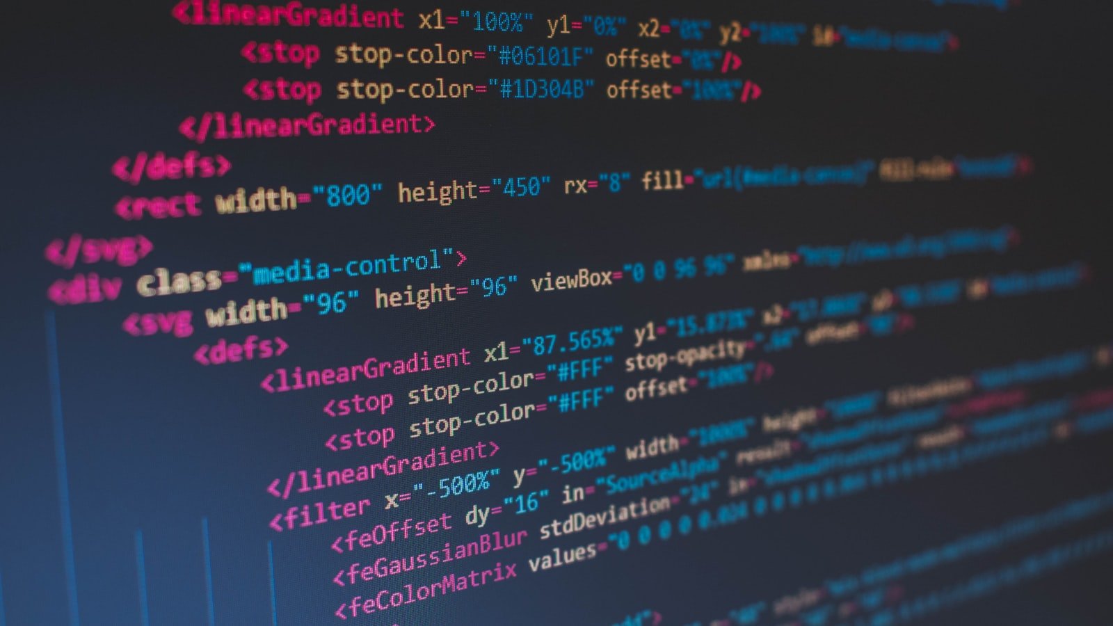 Modern laptop screen with code, evoking Render's developer-first PaaS experience